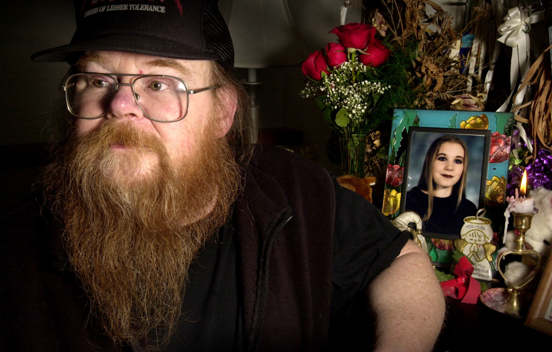 Phil Ellenbecker with portrait of Malinda